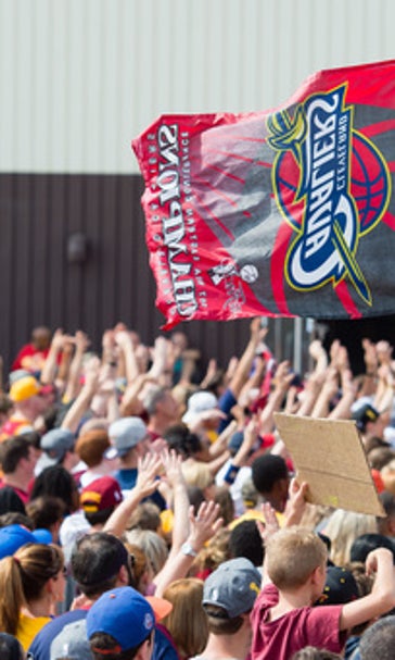 The Latest: James tells reporters he plans to stay with Cavs